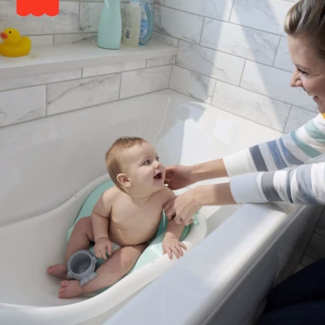 Fisher-Price Baby to Toddler Bath 4-in-1 Sling ‘n Seat Tub with Removable Infant Support and 2 Toys, Climbing Leaves