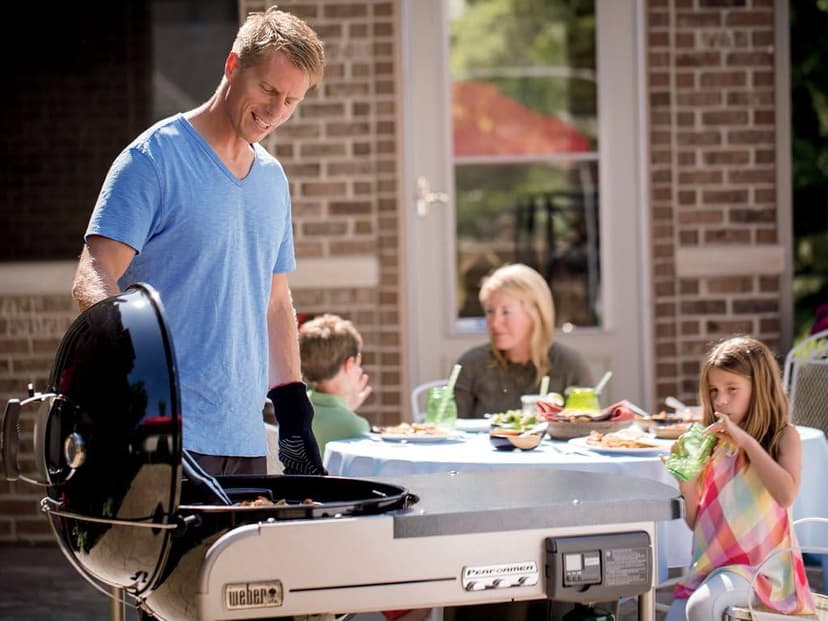 Weber Performer Deluxe Charcoal Grill, 22-Inch, Touch-N-Go Gas Ignition System, Black