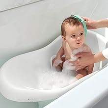 Fisher-Price Baby to Toddler Bath 4-in-1 Sling ‘n Seat Tub with Removable Infant Support and 2 Toys, Climbing Leaves