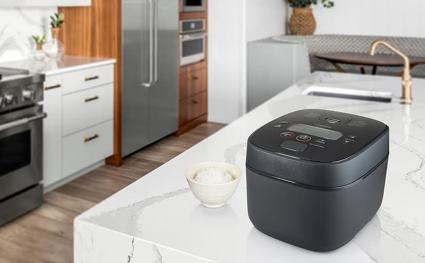 Zojirushi NW-QAC10 5.5-Cup Capacity Flat-Top Induction Cooker and Warmer with Custom Cooking Pan, Double Non-Stick Coating for Easy Clean-Up (Black)