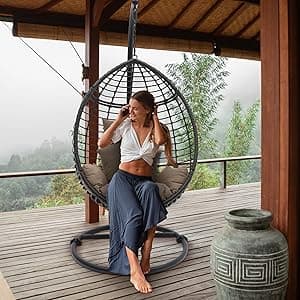 SereneLife Hanging Wicker Egg Swing Chair with Cushions & Stand – Brown Rattan Outdoor/Indoor Chair with 66 lb Capacity, Powder-Coated Steel Frame, Washable Weather-Resistant Cushions