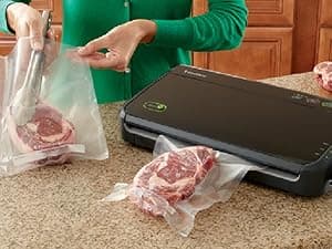FoodSaver Vacuum Sealer Machine, Automatic Bag Detection, Sous Vide Friendly, with sealer bags, roll, handheld vacuum sealer, black