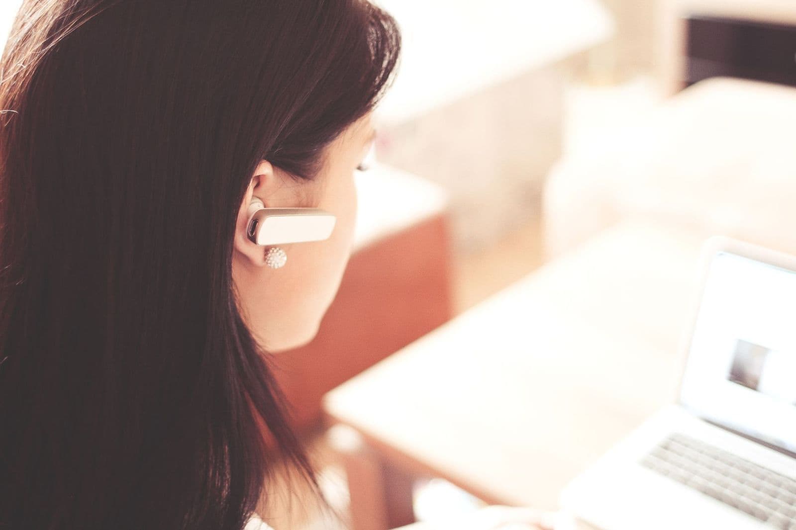Person wearing best bluetooth headsets for working out during a gym session