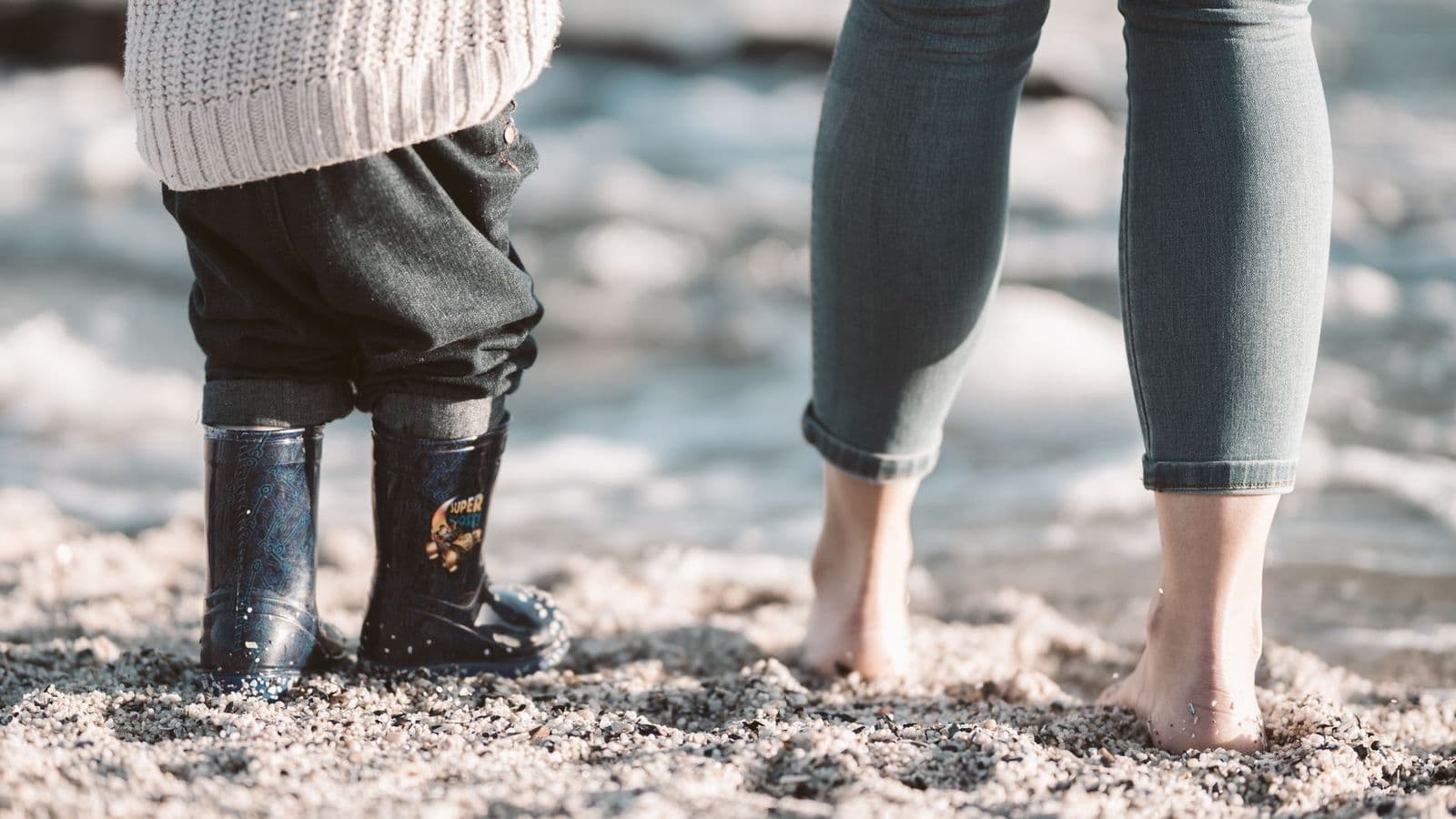 Pair of best barefoot work boots with a wide toe box on a workshop floor