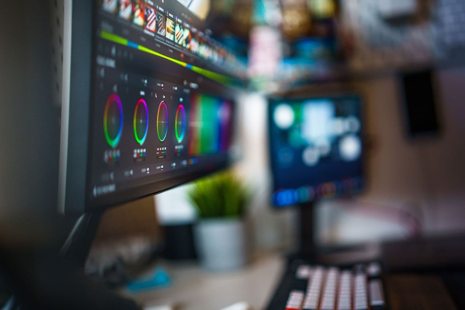 Large 8k monitor on a desk showing a detailed image